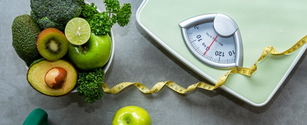 Organic Green apple and Weight scale measure tap with nutrition vegan vegetable